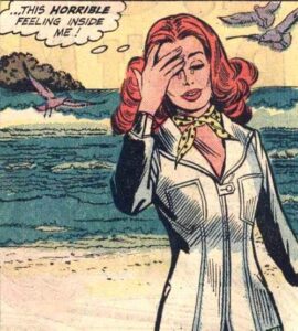 Vintage comic frame of red-headed woman on beach, crying and touching her forehead, thought bubble reading "this horrible feeling inside me!" 
