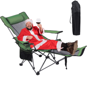 green lounge chair with man in santa costume sitting on it, raising a glass of red wine to the camera